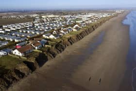 Houses on the coastline in Skipsea, East Riding of Yorkshire