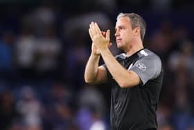 LEEDS, ENGLAND - AUGUST 24: Michael Duff, Manager of Barnsley applauds fans after the Carabao Cup Second Round match between Leeds United and Barnsley at Elland Road on August 24, 2022 in Leeds, England. (Photo by George Wood/Getty Images)