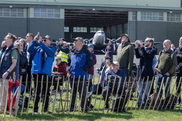 Crowd watch the Flying Legends warbirds