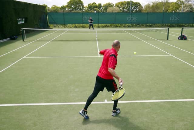 People play tennis at York Tennis Club as some lockdown restrictions on leisure activities including tennis, water sports, angling and golf were lifted back in May 2020 (Picture: Danny Lawson/PA Wire)