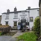 Local residents hope to turn The Farmers Arms, Muker into a community owned pub photographed for The Yorkshire Post by Tony Johnson. 27th October 2023