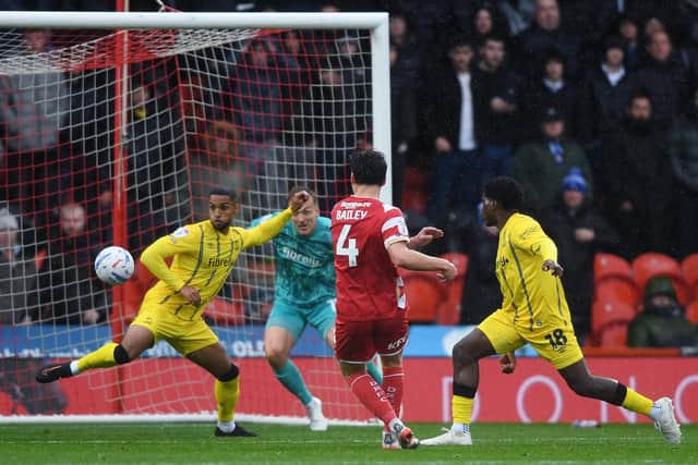 FINAL INSULT: Owen Bailey scores Doncaster Rovers's second goal in Henrik Pedersen's final game as manager (Image: Jonathan Gawthorpe)