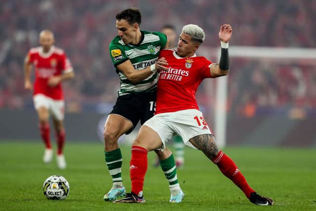 Benfica's Argentinian midfielder Enzo Fernandez (R) vies with Sporting's Uruguayan midfielder Manuel Ugarte during the Portuguese League football match between SL Benfica and Sporting CP at the Luz stadium in Lisbon on January 15, 2023. (Photo by CARLOS COSTA / AFP) (Photo by CARLOS COSTA/AFP via Getty Images)