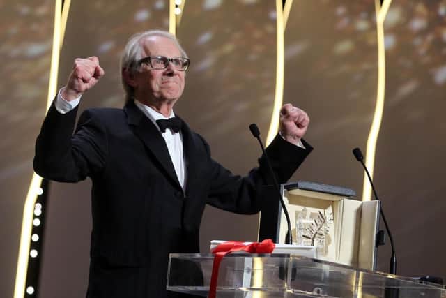 Ken Loach collects the award at the Cannes Film Festival. 