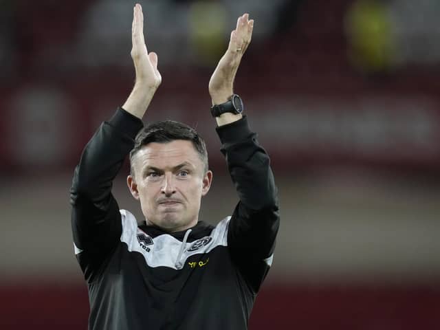 WARNING: Sheffield United manager Paul Heckingbottom applauds the home fans at full-time