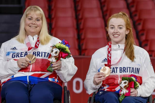 MEDAL WINNERS: Megan Shackleton (right) and Sue Bailey celebrate their bronze medals at the Tokyo Paralympics. Picture: Tasos Katopodis/Getty Images