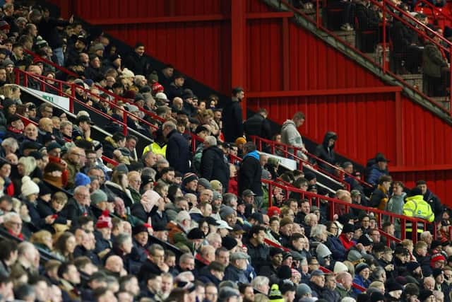 SHEFFIELD, ENGLAND - MARCH 04: Sheffield United fans leave their seats after Gabriel Martinelli puts Arsenal 3-0 up after just 15 minutes