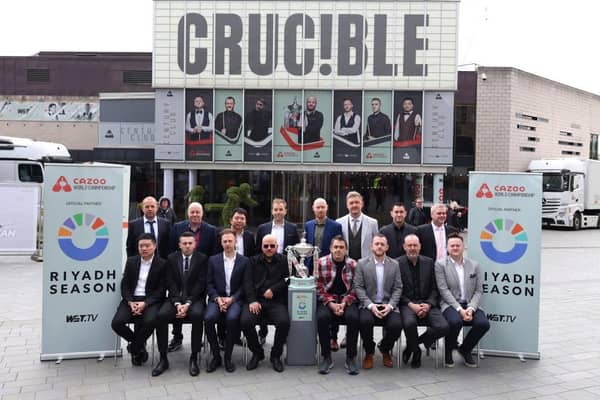 Right on cue: The top 16 players, Back row (L-R), Barry Hawkins of England, John Higgins of Scotland, Zhang Anda of China, Allister Carter of England, Gary Wilson of England, Kyren Wilson of England, Tom Ford of England, Robert Milkins of England, Front row (L-R), Ding Junhui of China, Mark Selby of England, Judd Trump of England, Luca Brecel of Belgium, Ronnie O'Sullivan of England, Mark Allen of Northern Ireland, Mark Williams of Wales and Shaun Murphy of England pose for a photo ahead of the Cazoo World Snooker Championship 2024 at Crucible Theatre (Picture: George Wood/Getty Images)
