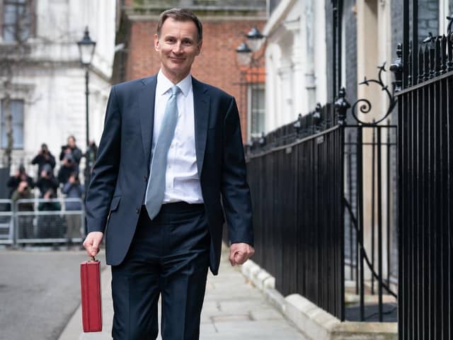 Chancellor of the Exchequer Jeremy Hunt leaves 11 Downing Street, London, with his ministerial box before delivering his Budget in the Houses of Parliament. PIC: Stefan Rousseau/PA Wire
