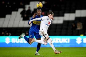 Former Leeds United prospect Max Dean has stood out for MK Dons this season. Image: Clive Mason/Getty Images