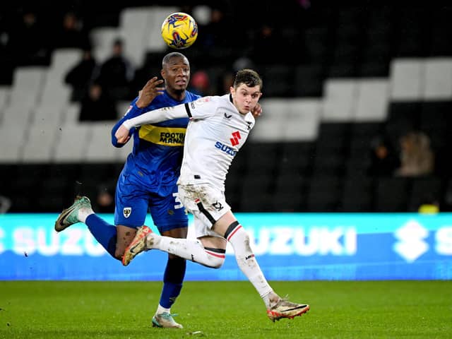 Former Leeds United prospect Max Dean has stood out for MK Dons this season. Image: Clive Mason/Getty Images