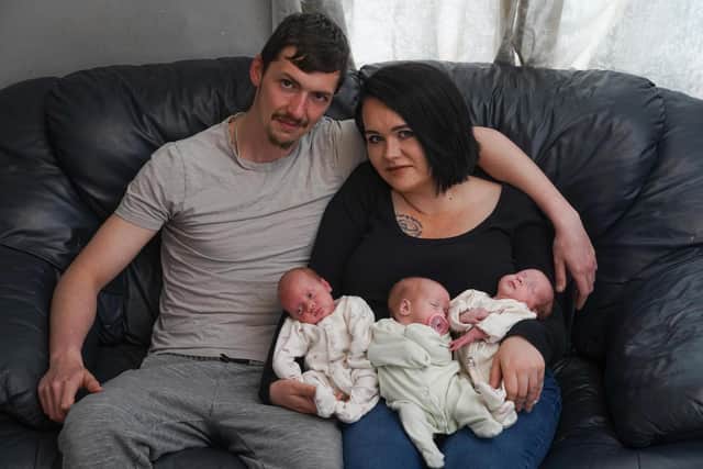 Dad James Casper, 26 and mum Jenni Casper 27, with their newly born triplets, Evalynn Casper, Harper-Gwen Casper and Marvella Casper.
