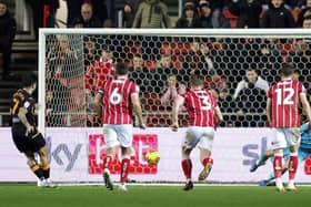 GETTING AHEAD: Hull City's Ozan Tufan scores their side's second goal of the game from the penalty spot at Ashton Gate. Picture: Nigel French/PA