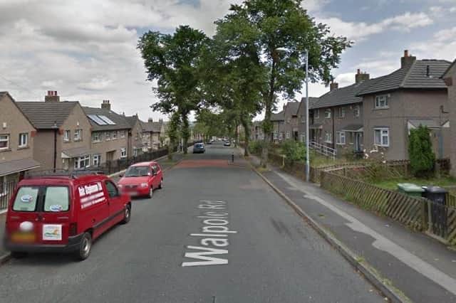 Police have launched an urgent investigation after three children and a woman were found seriously injured at a house in Huddersfield.