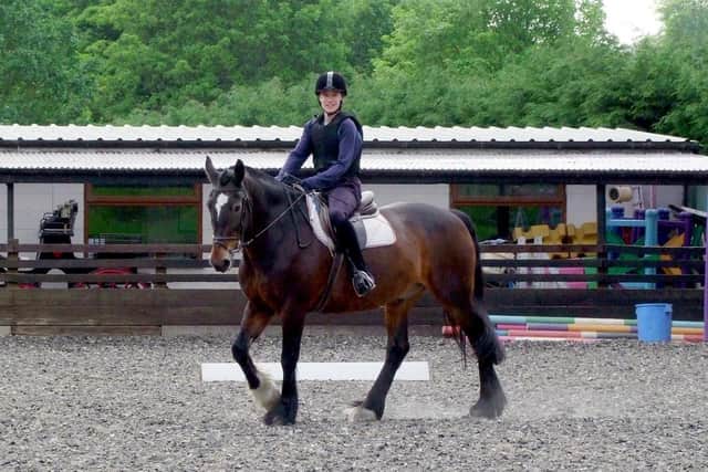 Oliver Peace, 31, of Upton who has won two titles at the RDA (Riding for the Disabled Association) National Championships. He is pictured in training.