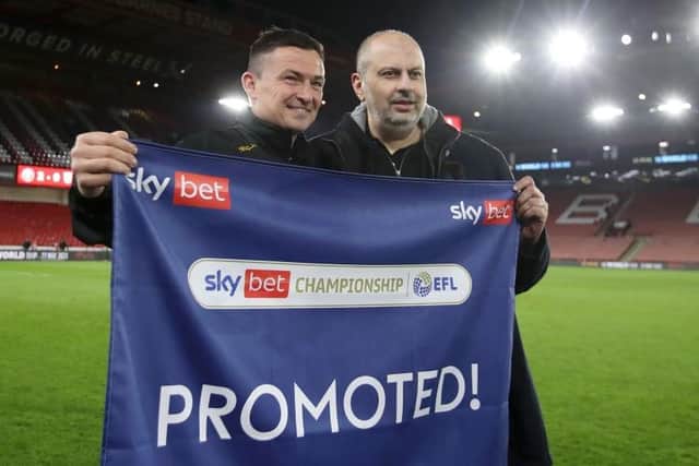 PROMOTION: Sheffield United owner Prince Abdullah bin Musaid Al Saud celebrates promotion with manager Paul Heckingbottom (left)