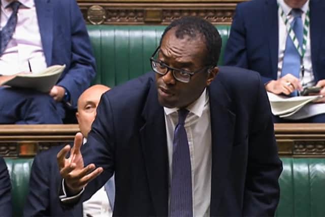 A video grab from footage broadcast by the UK Parliament's Parliamentary Recording Unit (PRU) shows Britain's Chancellor of the Exchequer Kwasi Kwarteng, answering questions in the House of Commons, in London, on October 11, 2022. - The Bank of England unveiled on October 11, 2022  more measures aimed at calming markets rocked by a UK budget as it warned over risks to the nation's financial stability. Finance minister Kwasi Kwarteng will unveil debt-reduction plans and independent economic predictions on October 31 rather than in late November. It comes after Chancellor of the Exchequer Kwarteng was already forced to axe a tax cut for the richest earners, in the face of outrage as millions of Britons face a cost-of-living crisis with UK inflation around 10 percent. (Photo by PRU / AFP) / RESTRICTED TO EDITORIAL USE - MANDATORY CREDIT "AFP PHOTO / PRU " - NO MARKETING - NO ADVERTISING CAMPAIGNS - DISTRIBUTED AS A SERVICE TO CLIENTS (Photo by -/PRU/AFP via Getty Images)