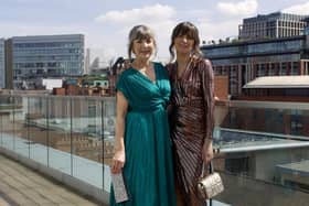 Pat wears emerald green pleated dress from a selection at Leem at Selfridges (stylist's own); Lizzy wears bronze sequin dress and accessories from the Smart Works Leeds pre-loved sale stock.Photography: Carla Dominguez @by.carladominguez | Styling: Stephanie Smith @yorkshirestyleq | Hair: Russell Eaton in Leeds | Bobbi Brown make-up artist Nancy Sheldon at John Lewis Leeds | Styling assistants: Amy Harrison and Lottie Roberts