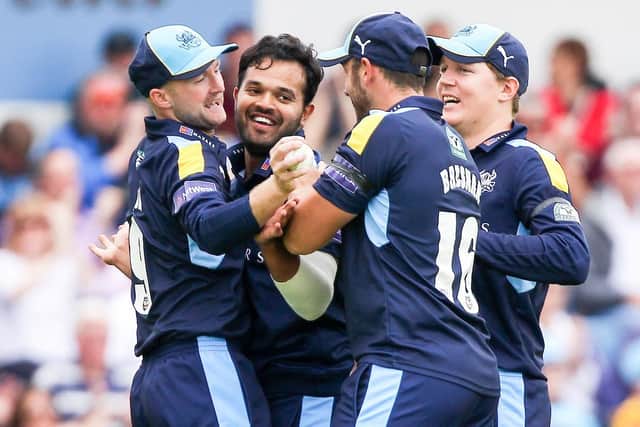 Happier times. Azeem Rafiq, second left, is congratulated by Adam Lyth, left, Tim Bresnan, second right, and Gary Ballance, right, after taking the wicket of Derbyshire's Chesney Hughes during a T20 Blast match at Headingley during Rafiq's second spell at Yorkshire in 2016. Picture by Alex Whitehead/SWpix.com