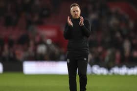 Huddersfield Town caretaker manager Jon Worthington applauds the fans at full time after the Sky Bet Championship match at Southampton. Picture: Steven Paston/PA Wire.