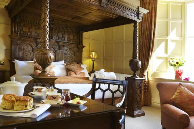 Choose the chauffeur’s room or former mechanic’s workshop with its original inspection pit hidden beneath the sumptuous bed in the transformed Carriage House restoration