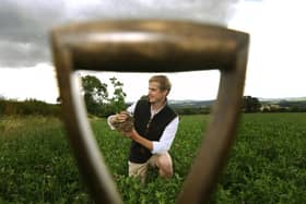 Alex Fraser amongst the red clover ley at Denby Hall Farm. .