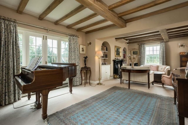 Another view of a reception room with a piano centre stage