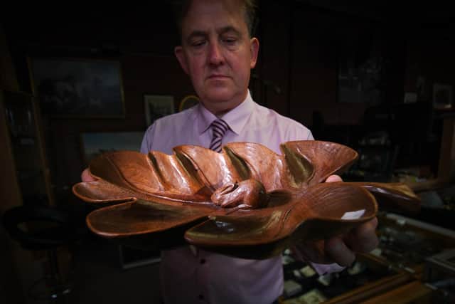 Tim Summersgill is pictured with  Peter Heap 'Rabbitman' oak centrepiece dish
