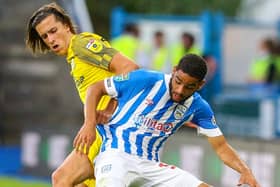 CHAMPIONSHIP DEBUT: Huddersfield Town's Brodie Spencer (right)