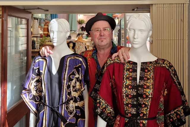 Steve Elvidge, owner of Space Harrogate, with some of the kaftans made from vintage batik fabrics.