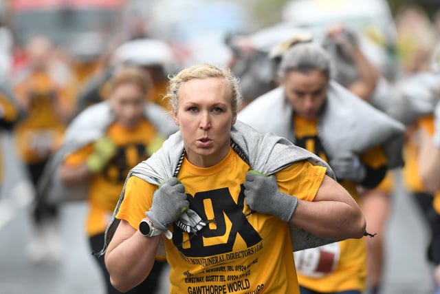 A female participant at the coal carrying race.