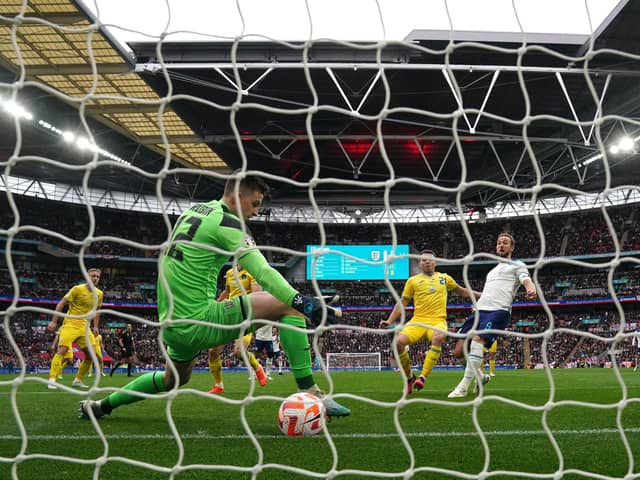 BREAKTHROUGH: England's Harry Kane (right) opens the scoring