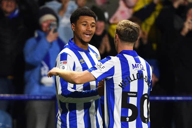 Sheffield Wednesday scorer Mason Burstow celebrates his goal against Cambridge United with Davis Keillor-Dunn. Picture: Steve Ellis.