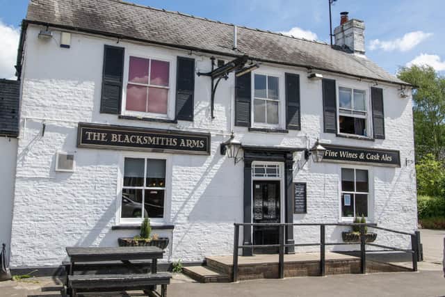 There used to be three pubs in Naburn in the mid 18th century, but by 1822 only the "Horse Shoe" remained. By 1872 it had acquired its current name of “The Blacksmiths' Arms". Photographed by Tony Johnson for The Yorkshire Post.  25th May 2023