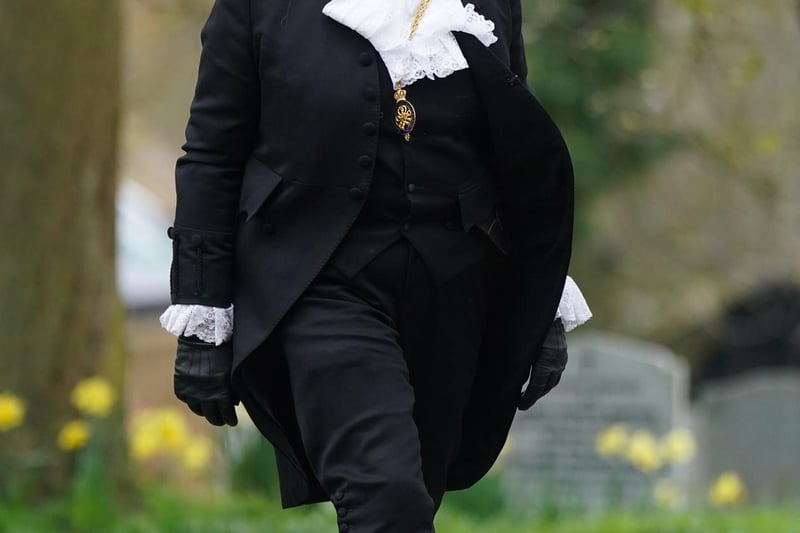 Lady Usher of the Black Rod, Sarah Clarke arrives for the funeral.