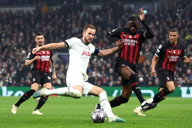Harry Kane of Tottenham Hotspur shoots whilst under pressure from Fikayo Tomori of AC Milan (Picture: Clive Rose/Getty Images)