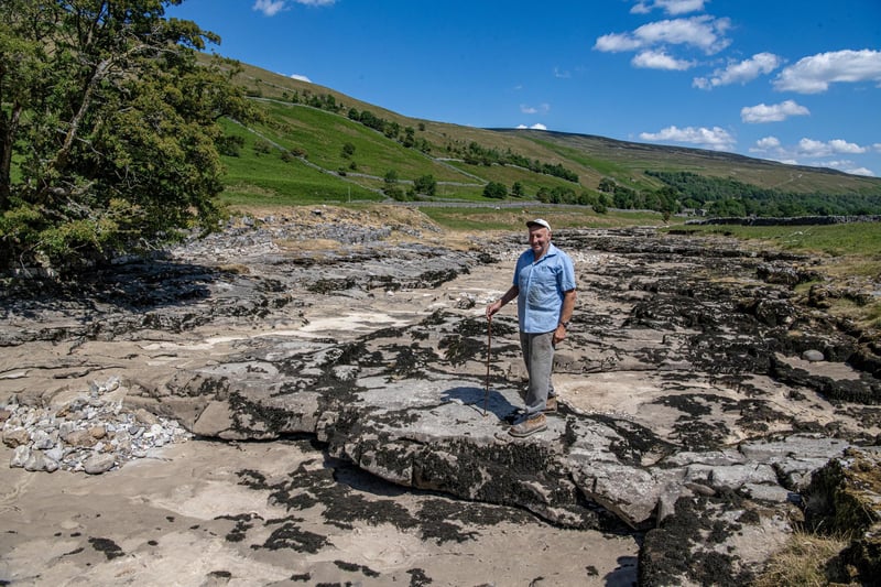 Local farmer Stewart Lund  by the River Skirfare in Littondale photographed for the Yorkshire Post by Tony Johnson.