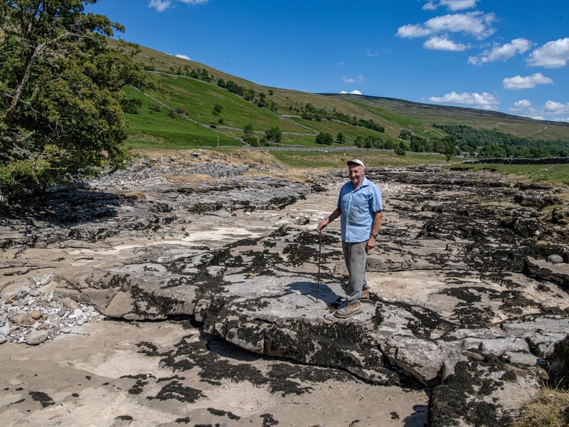 Local farmer Stewart Lund  by the River Skirfare in Littondale photographed for the Yorkshire Post by Tony Johnson.