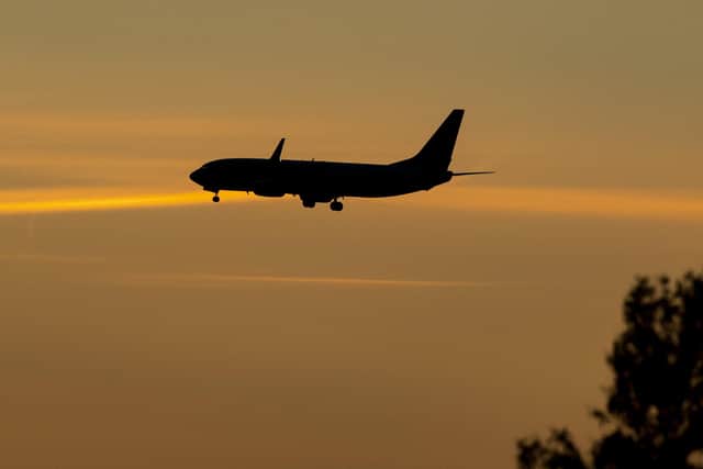 A plane coming in to land at an airport. PIC: Peter Byrne/PA Wire