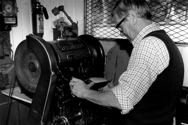 A cobbler operating a stitching machine at Malhams. Photo: Hartlepool Museum Service.