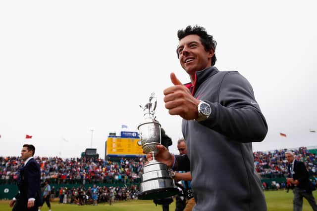 Rory McIlroy of Northern Ireland gives a thumbs up to the crowd after his two-stroke victory at The 143rd Open Championship at Royal Liverpool on July 20, 2014 (Picture: Tom Pennington/Getty Images)
