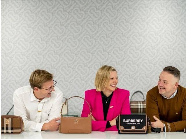Left to Right: Rob Blomfield, Burberry; Abigail Scott Paul, LEEDS 2023 and Nick Lee, Burberry at the Burberry office in Leeds. Image by Jemma Mickleburgh.