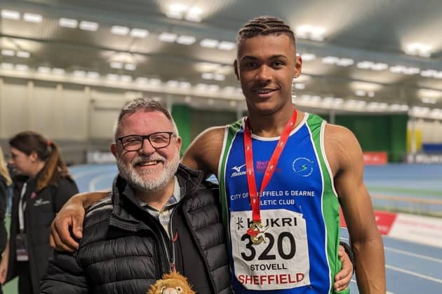Proud moment for Under-17s national 400m champion Ruben Stovell, right, and his dad Andy.