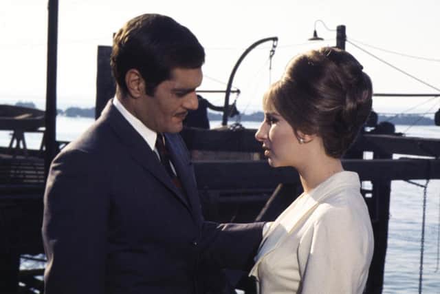 Barbra Streisand as Fanny Brice and Omar Sharif as Nick Arnstein in Funny Girl. (Photo by FilmPublicityArchive/United Archives via Getty Images).
