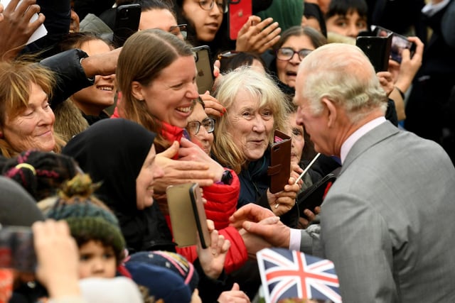 King Charles was met by hundreds of supporters
