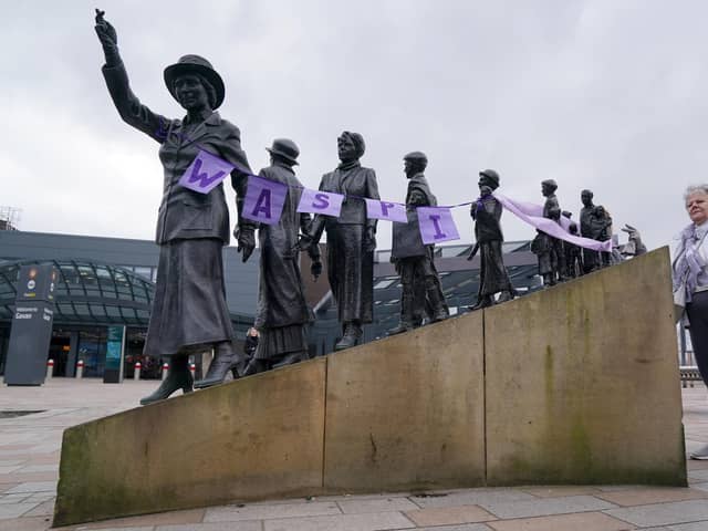 Library image of campaigners for Women Against State Pension Inequality Campaign (Waspis) gathering at the statue of political activist Mary Barbour, the woman who led rent strikes during the First World War, in Govan, Glasgow, to mark International Women's Day. (Photo by Andrew Milligan/PA Wire)