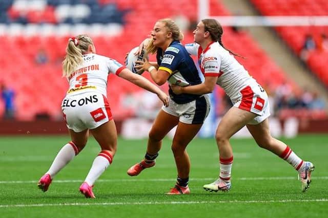Leeds' Lucy Murray is tackled by Eboni Partington and Luci McColm. Picture by Will Palmer/SWpix.com.