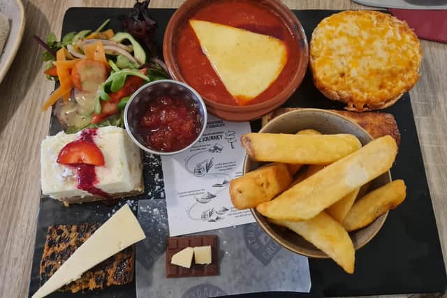 "I ordered a Cheesy Afternoon Tea for one, priced at £19.50, with an add-on baked Wensleydale blue cheese for £6. I was given the option of tea or coffee, and a filter coffee arrived shortly afterwards."