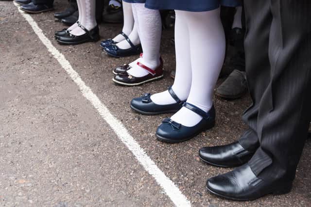 A councillor said a parent only had one pair of school shoes so had to send their children to school on separate days.