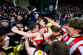 Sheffield United's Anel Ahmedhodzic celebrates with the fans after scoring their side's second goal of the game during the Sky Bet Championship match at Bramall Lane, Sheffield. Photo credit: David Davies/PA Wire.